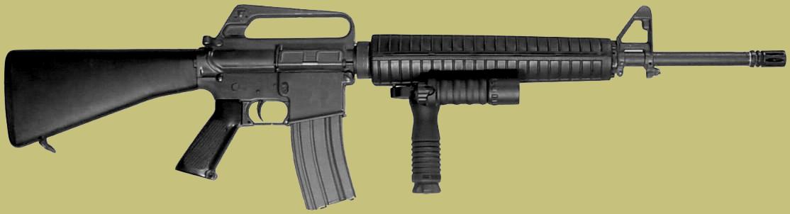 In this photo the RMgrip with the flahslight accessory is mounted to the M16 rifle handgrip or rifle grip.